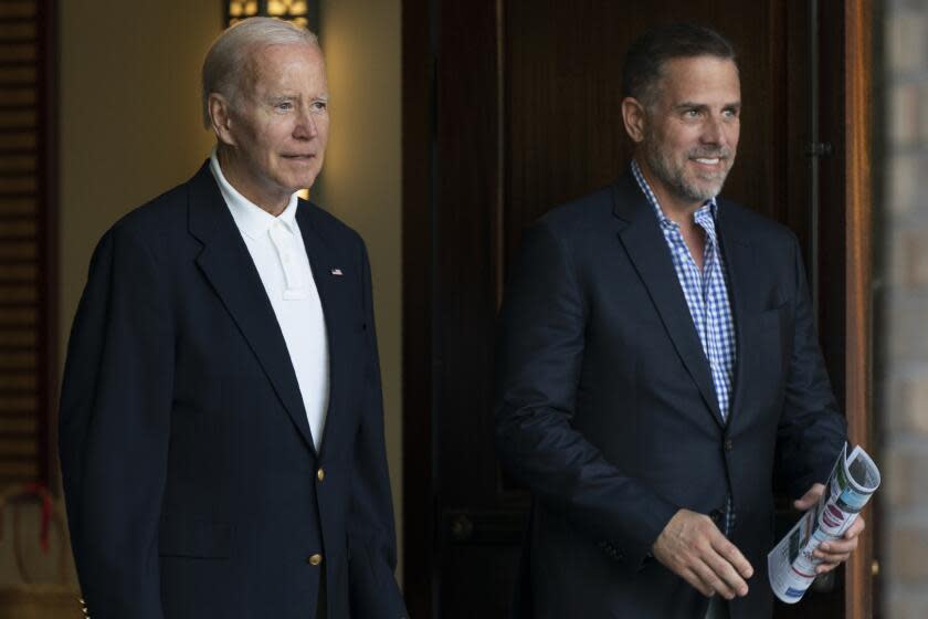 FILE - President Joe Biden and his son Hunter Biden leave Holy Spirit Catholic Church in Johns Island, S.C., after attending a Mass on Aug. 13, 2022. Biden is in Kiawah Island with his family on vacation. An IRS special agent is seeking whistleblower protection to disclose information regarding what the agent contends is mishandling of an investigation into President Joe Biden's son, Hunter Biden. That is according to a letter to Congress obtained by The Associated Press. (AP Photo/Manuel Balce Ceneta, File)
