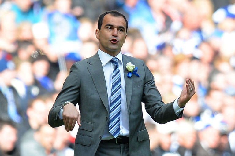 Wigan Athletic's manager Roberto Martinez gestures during the English FA Cup final at Wembley Stadium in London on May 11, 2013. Martinez admitted he was starting to plan for extra-time when Ben Watson scored the goal that sealed one of the great FA Cup final upsets as his underdogs shocked 10-man Manchester City 1-0