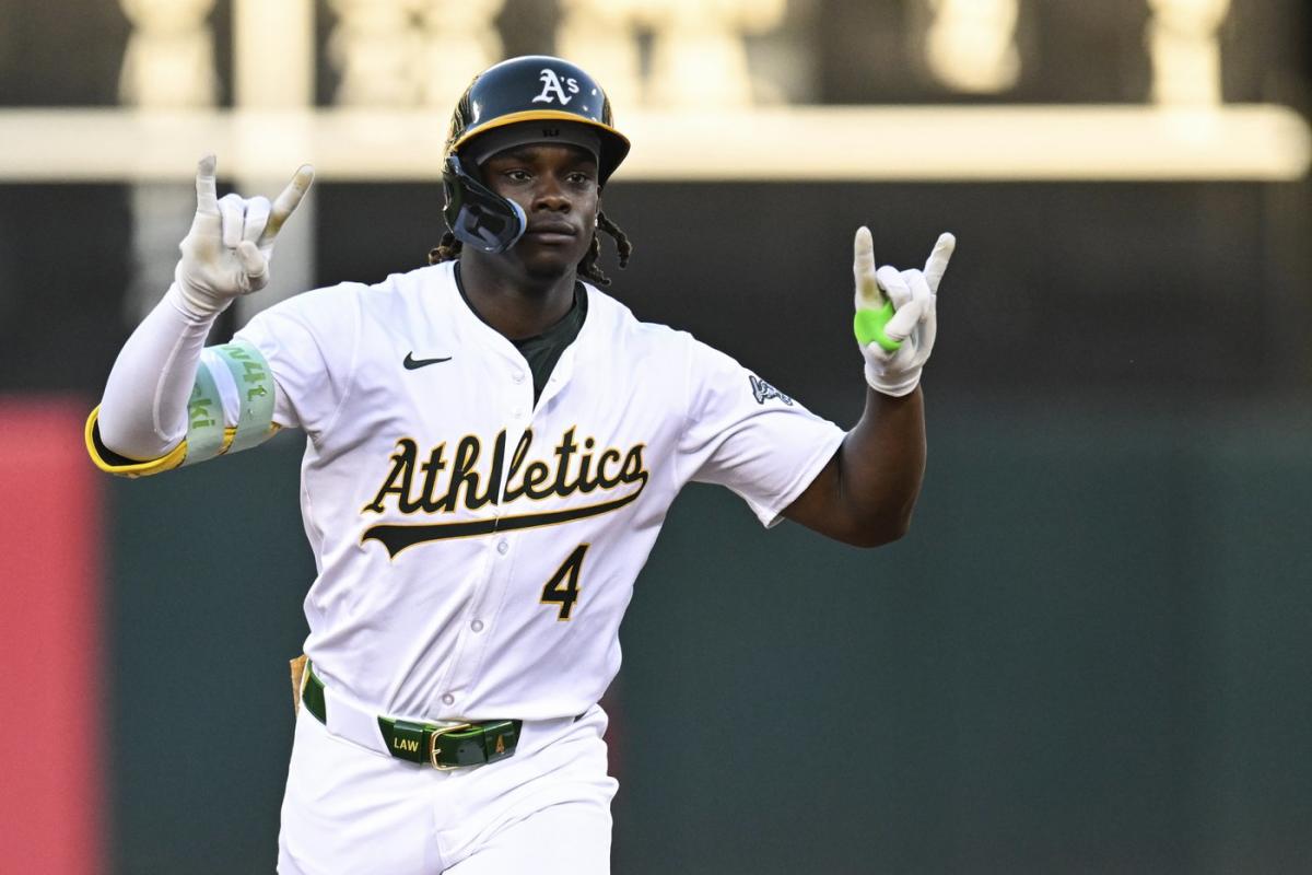 Butler, Rooker go deep and Athletics top Angels 7-5