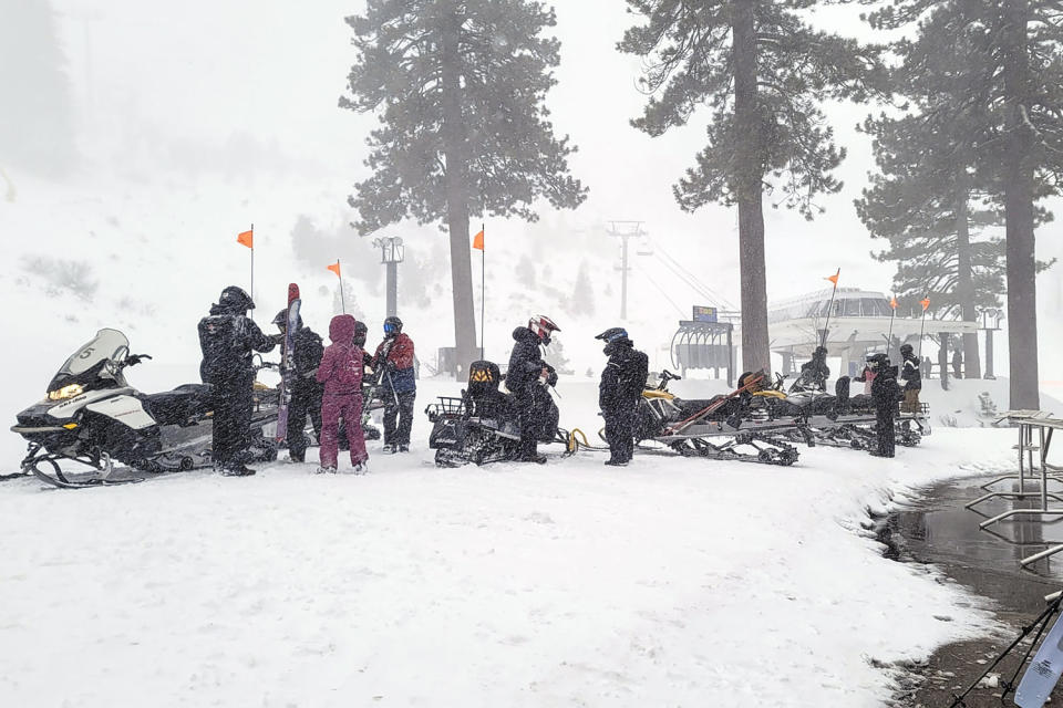 Image: Rescues crews work at the scene of an avalanche at a California ski resort near Lake Tahoe  (Mark Sponsler via AP)