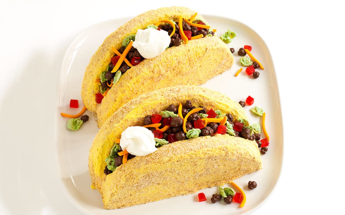 <p>Sheri Giblin</p><p>Don’t be fooled—this taco platter has a sweet side! See this cake come together in a magical stop-motion how-to video at the link below.</p><p><strong>Get the Recipe: <a href="/53353/tack-richardson/shell-game-make-taco-cakes/" data-ylk="slk:Taco Cakes Recipe;elm:context_link;itc:0;sec:content-canvas" class="link rapid-noclick-resp">Taco Cakes Recipe</a></strong></p>