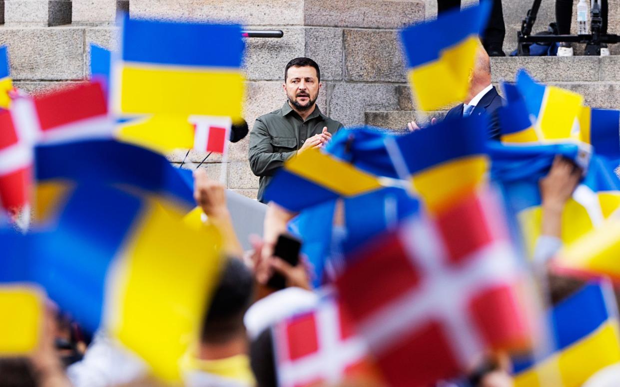 Volodymyr Zelenskyy addresses the Danish people from the steps of Christiansborg palace, the seat of Danish Parliament