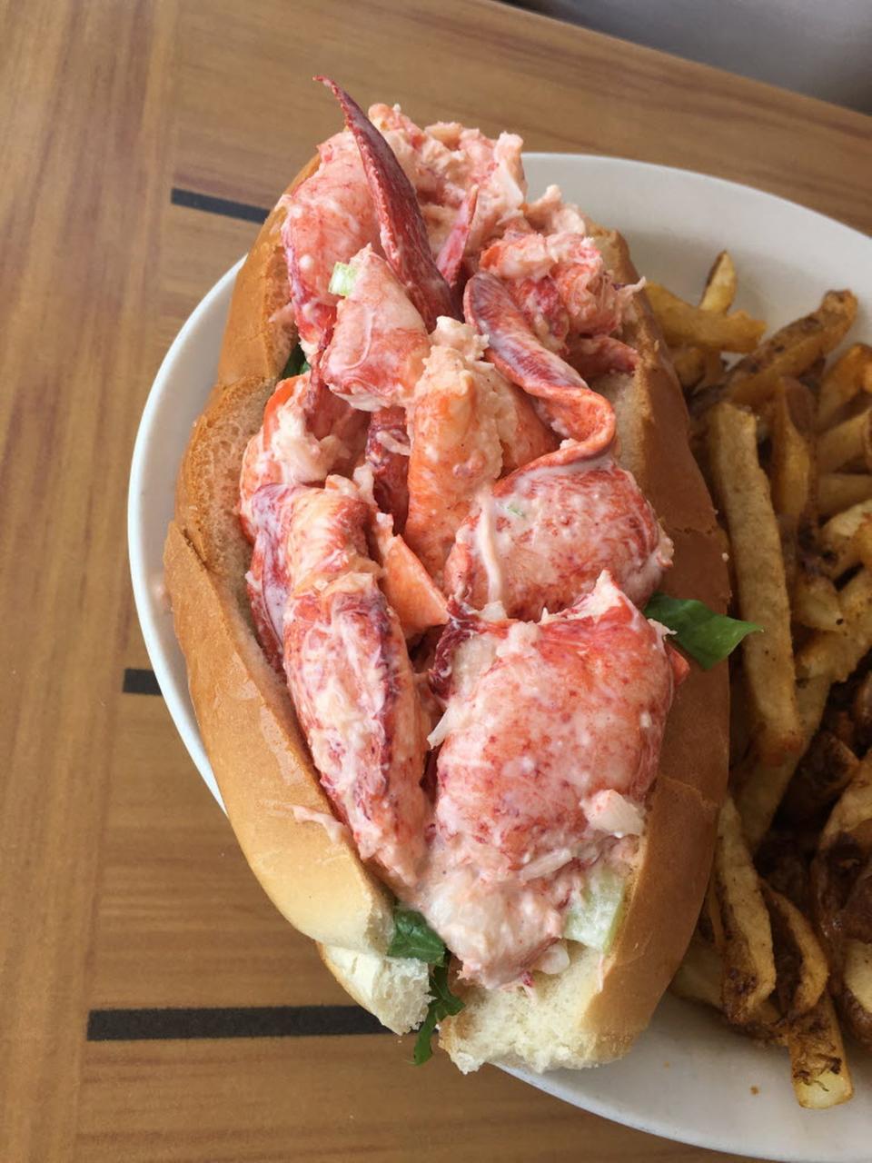 The lobster roll at Matunuck Oyster Bar, in South Kingstown, includes larger-than-average chunks of lobster, artfully arranged in a hefty split-top roll warmed with lots of butter.
