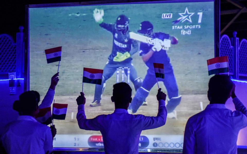 The recent India-Pakistan cricket match was a target for crypto adverts - AFP