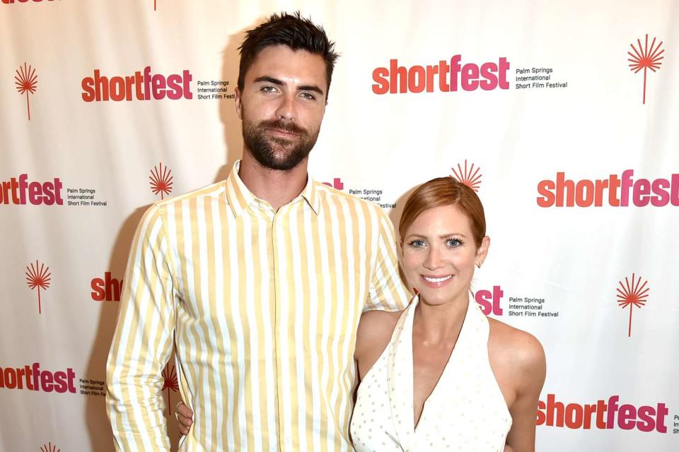 <p>David Crotty/Getty</p> Tyler Stanaland and Brittany Snow in June 2019