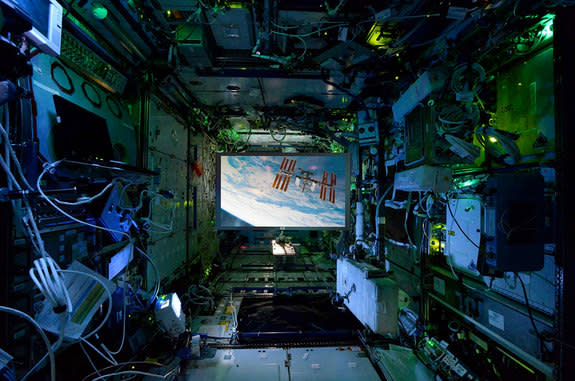 This composite image shows the Screen Innovations' ISS Viewscreen deployed onboard the space station.