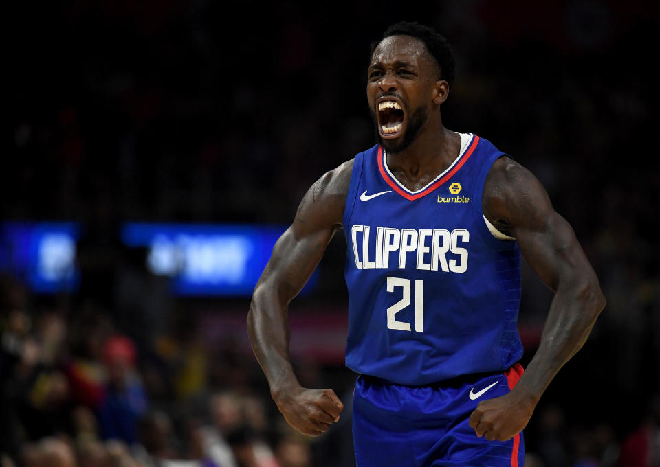 Patrick Beverley #21 of the LA Clippers reacts to a Montrezl Harrell #5 basket and foul in a 112-102 win over the Los Angeles Lakers during the LA Clippers season home opener at Staples Center on October 22, 2019 in Los Angeles, California. (Photo by Harry How/Getty Images)