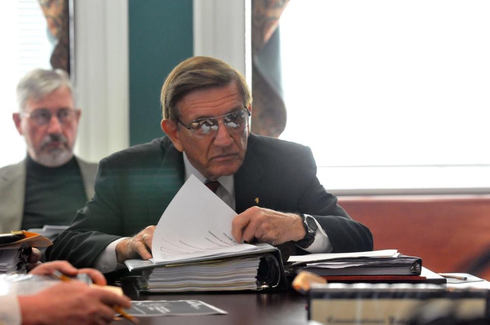 Chatham County Commission Chairman Pete Liakakis prepares for his final meeting as Chairman on Friday December 21, 2012.