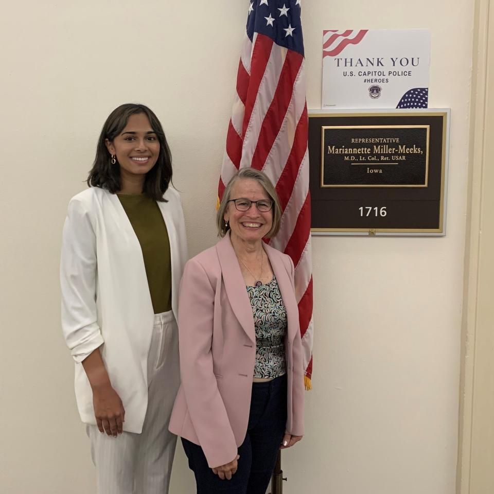 Pareen Mhatre (left) and U.S. Representative Mariannette Miller-Meeks (right) stand outside the congressmember's office after meeting to discuss the 200,000 documented Dreamers, like Mhatre, who have been excluded from proposed solutions in Congress for DACA recipients.