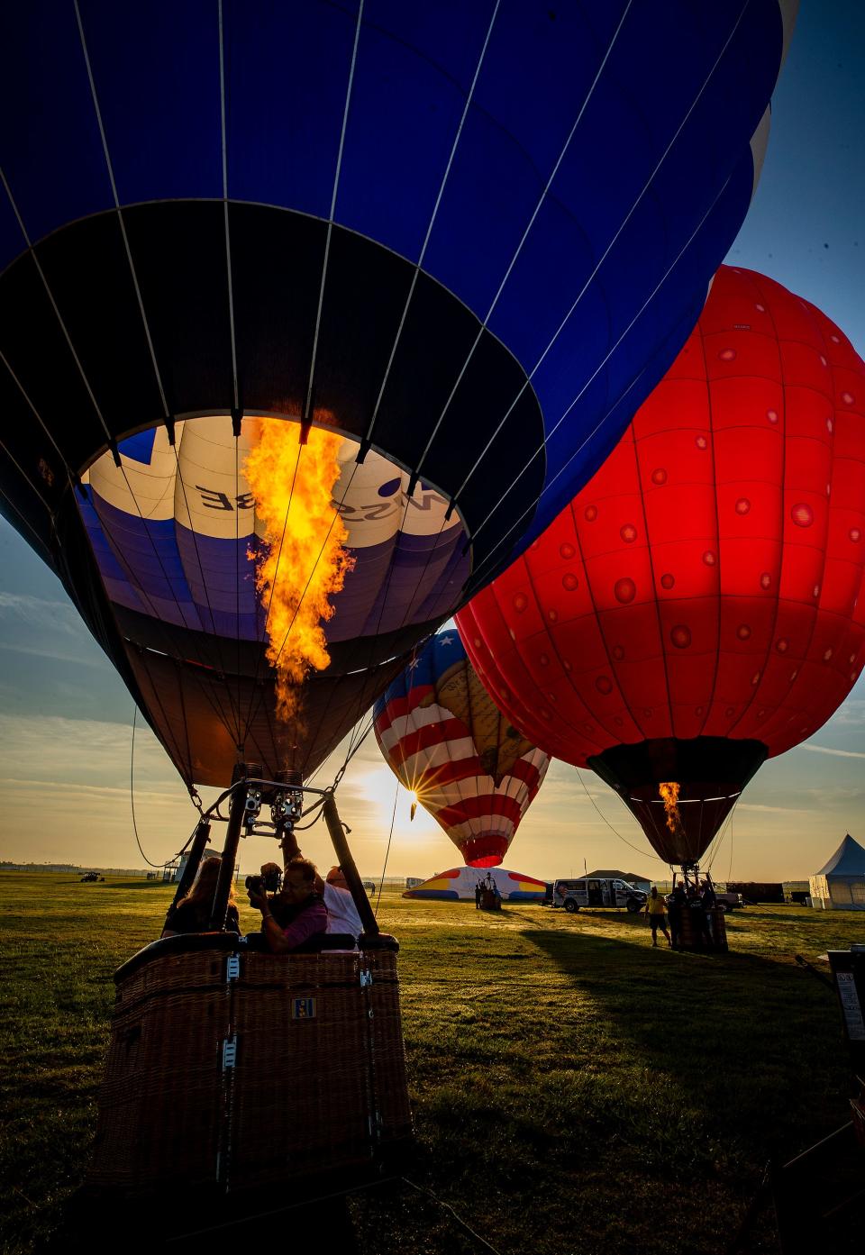 Balloon crews get set to take off for a media flight event during the Up Up And Away Florida Hot Air Balloon and Music Festival at Sun 'n Fun at Lakeland Linder International Airport on Friday.