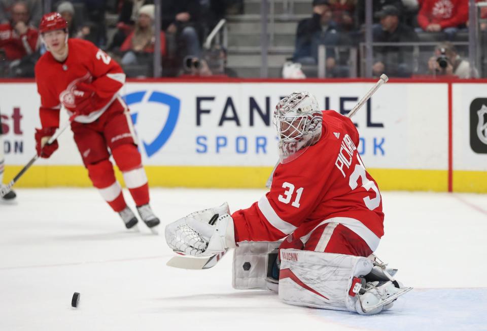 Detroit Red Wings goaltender Calvin Pickard (31)makes a save against the Chicago Blackhawks during second period action Wednesday, Jan. 26, 2022 at Little Caesars Arena.