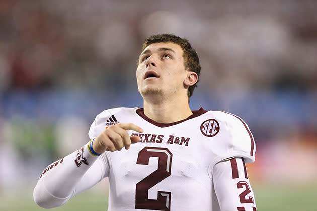 Drake does signature money sign with Johnny Manziel at Houston concert