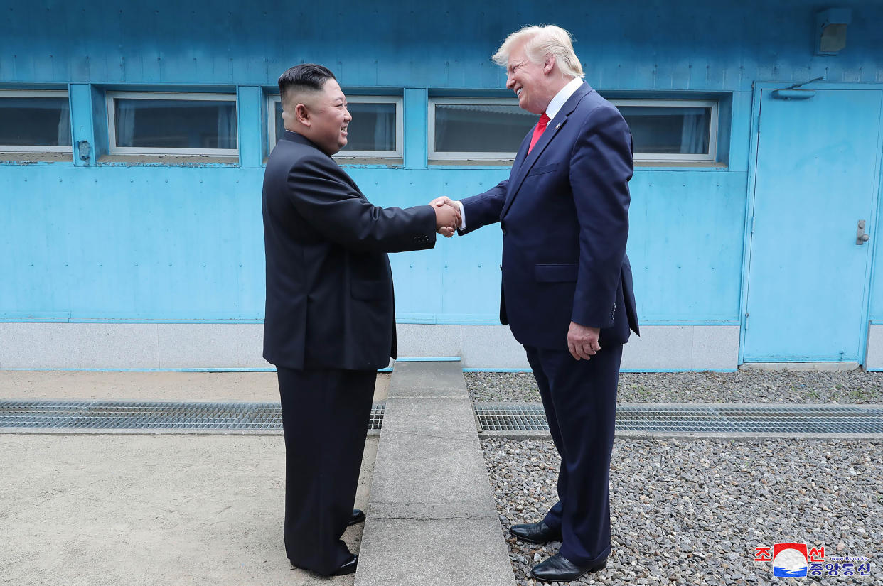 FILE - In this photo provided by the North Korean government, North Korean leader Kim Jong Un, left, and U.S. President Donald Trump shake hands over the military demarcation line at the border village of Panmunjom in Demilitarized Zone on June 30, 2019. It's been 10 years since Kim Jong Un took power in North Korea after his father suddenly died of a heart attack. The content of this image is as provided and cannot be independently verified. Korean language watermark on image as provided by source reads: "KCNA" which is the abbreviation for Korean Central News Agency. (Korean Central News Agency/Korea News Service via AP, File)