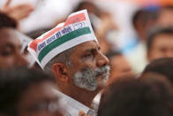 A supporter of Congress party listens a speech by the party's president Sonia Gandhi (unseen) before what the party calls as "Save Democracy" march to parliament in New Delhi, May 6, 2016. REUTERS/Altaf Hussain