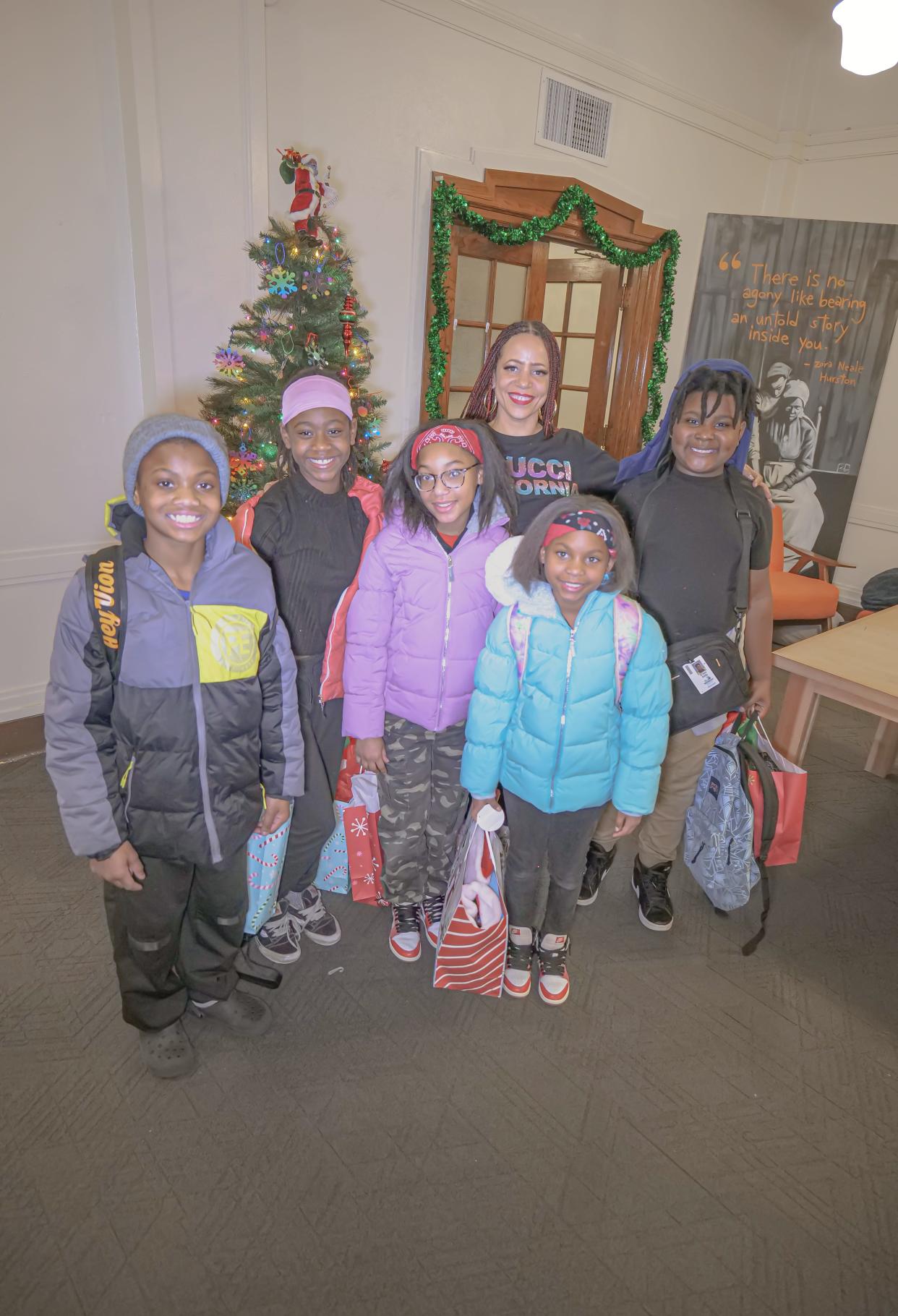 Nikole Hannah-Jones (back) with students from The 1619 Freedom School during the program's holiday party.