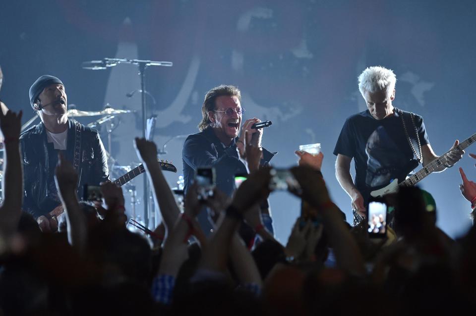 The Edge, from left, Bono and Adam Clayton of U2 perform during a concert at the Apollo Theater on June 11, 2018, in New York. U2 performed a pop-up concert on Fremont Street in downtown Las Vegas on Sept. 17, 2023 in advance of the band's residency at the MSG Sphere starting Sept. 29.