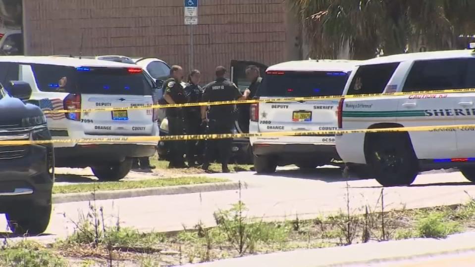 A deputy shot at two armed men during a traffic stop Friday morning in the Pine Hills neighborhood, Orange County Sheriff John Mina said.