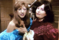 <p>In “The One With the Prom Video,” we see Rachel (Jennifer Aniston) and Monica (Courteney Cox) getting ready for the prom in classic ’80s dresses, complete with poofy sleeves and shiny chiffon. This may be one instance where we are pleased that certain styles go out of fashion! There is also a sweet appearance from a dorky Ross complete with ruffles. (Photo: NBC/Everett Collection) </p>