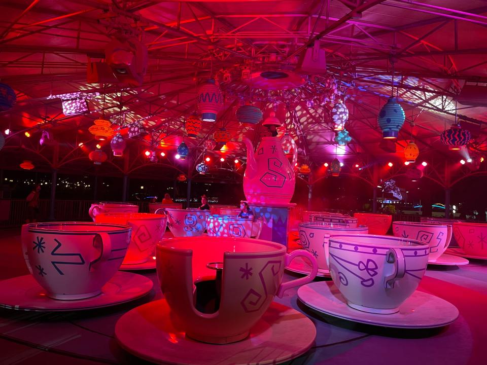 mad tea party at magic kingdom with holiday overlay