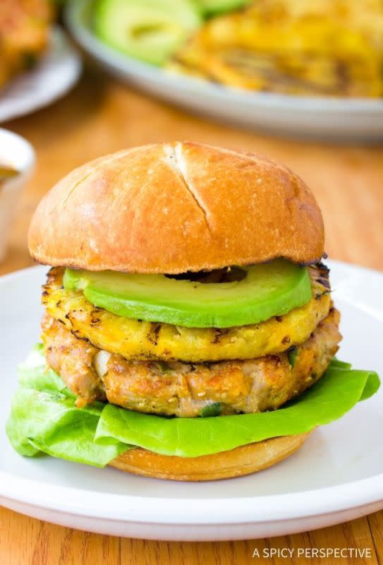 <p>A Spicy Perspective</p><p>Light and flavorful Ahi tuna burgers topped with sweet grilled pineapple. Big island flavor stacked high on a bun.</p><p><strong>Get the recipe: <a href="https://www.aspicyperspective.com/ahi-tuna-burgers-grilled-pineapple/" rel="nofollow noopener" target="_blank" data-ylk="slk:Ahi Tuna Burgers with Grilled Pineapple;elm:context_link;itc:0;sec:content-canvas" class="link ">Ahi Tuna Burgers with Grilled Pineapple</a></strong></p>