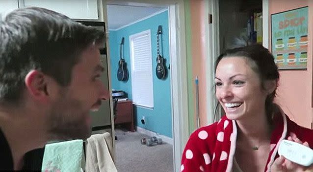 Sam Rader reveals to wife Nia she's pregnant. Source: YouTube/Sam and Nia