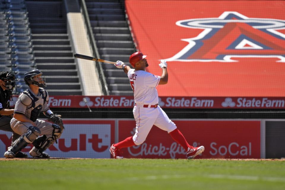 Angels slugger Albert Pujols hits a grand slam against the Houston Astros.