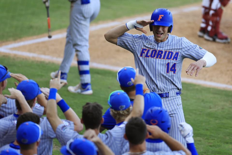 Florida utility Jac Caglianone (14) reacts to his home run during the fifth inning of a regular season NCAA baseball game at 121 Financial Ballpark in Jacksonville, Fla. Florida defeated Florida St. 7-5. [Corey Perrine/Florida Times-Union]