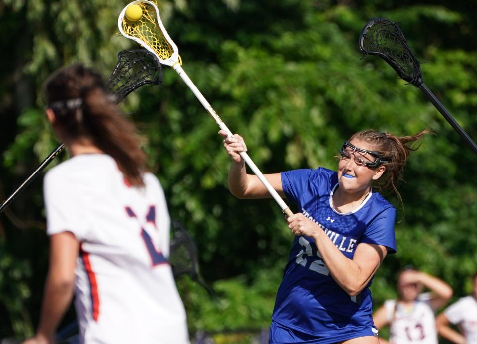 Bronxville's Catherine Berkery (22) takes a shot on goal during the Class D girls lacrosse championship game against Briarcliff at Nyack High School in Nyack on Thursday, May 25, 2023.