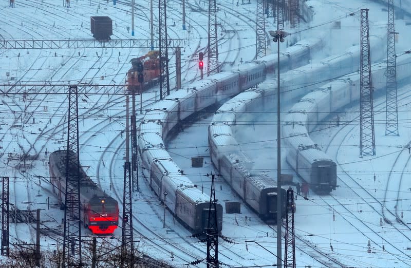 FILE PHOTO: Trains are seen on the Trans-Siberian railway on a cold day in the Siberian city of Krasnoyarsk