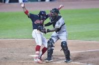 Jun 19, 2018; Cleveland, OH, USA; Cleveland Indians shortstop Francisco Lindor (12) is tagged by Chicago White Sox catcher Omar Narvaez (38) after striking out in the seventh inning at Progressive Field. Mandatory Credit: David Richard-USA TODAY Sports