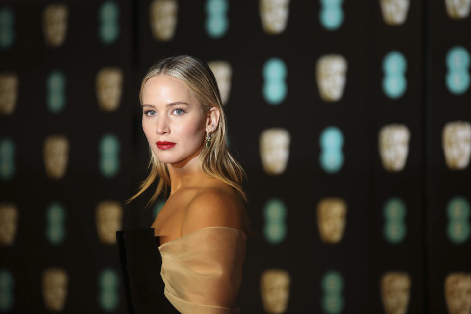 Actress Jennifer Lawrence poses for photographers upon arrival at the BAFTA Awards 2018 in London, Sunday, Feb. 18, 2018. (Photo by Vianney Le Caer/Invision/AP)