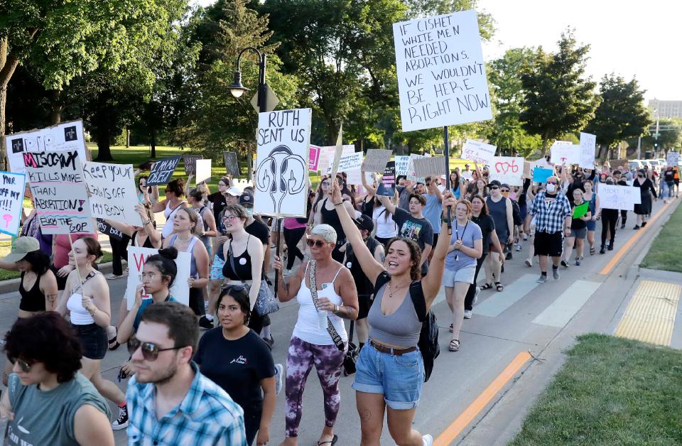 A crowd marches on College Avenue during a protest of the U.S. Supreme Court's decision to overturn Roe v. Wade on June 24 in Appleton.