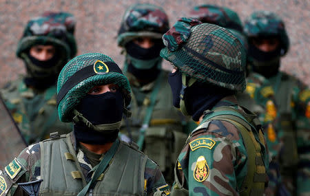 Special forces soldiers guard the National Election Authority, which is in charge of supervising the 2018 presidential election in Cairo, Egypt, January 24, 2018. REUTERS/Amr Abdallah Dalsh TPX IMAGES OF THE DAY