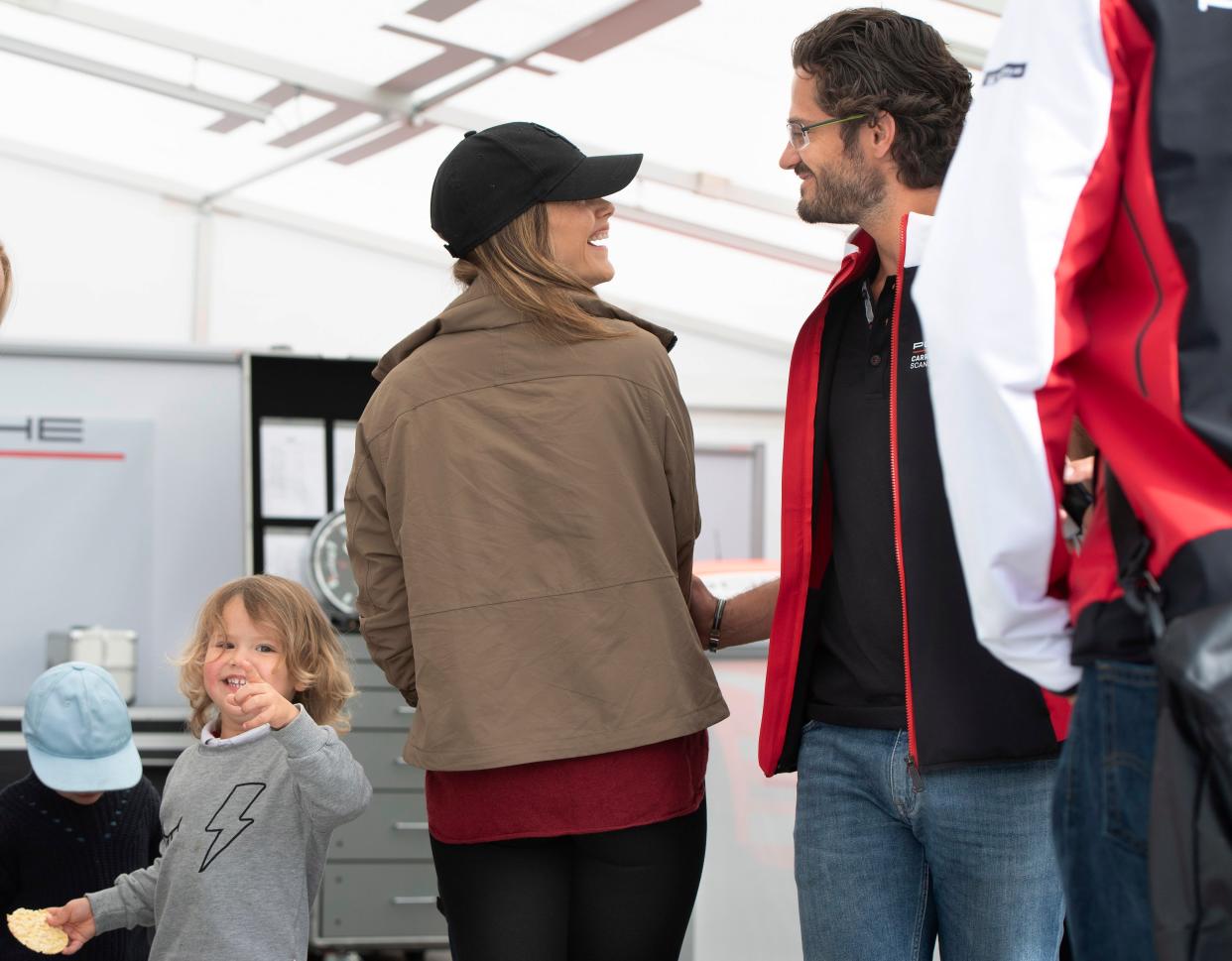 Princess Sofia (C) and Prince Carl Philip of Sweden (R) with their sons Prince Alexander (2-L) and Prince Gabriel (L) join a visit to the Gellerasen Motor stadium in Karlskoga, Sweden, in 2019 (EPA)