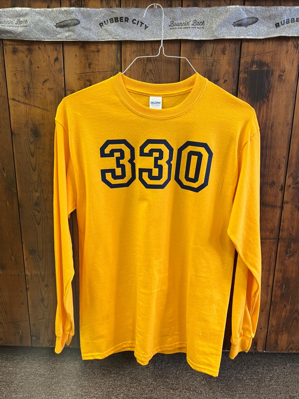 The Akron/Summit Convention & Visitors Bureau is asking residents to celebrate 330 Day by wearing a locally themed shirt like this one sold by Rubber City Clothing in Akron on March 30.