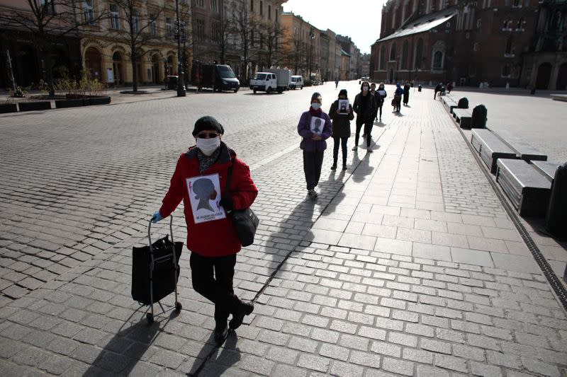 Activists protest against an initiative to tighten abortion rules in Krakow