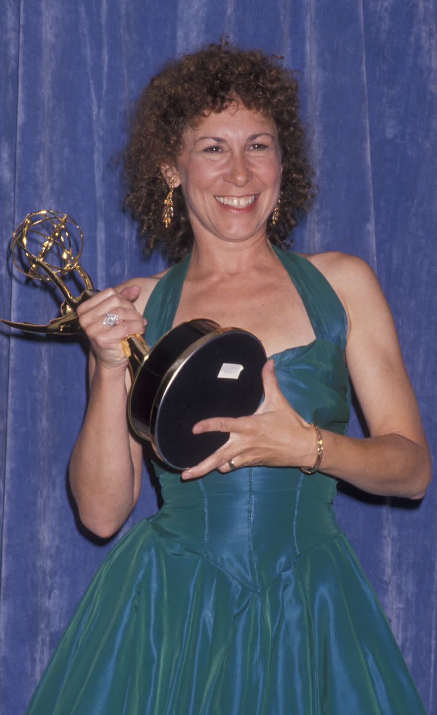 <p>Wearing a two-toned turquoise dress, the comedic powerhouse took home her fourth Emmy. </p>