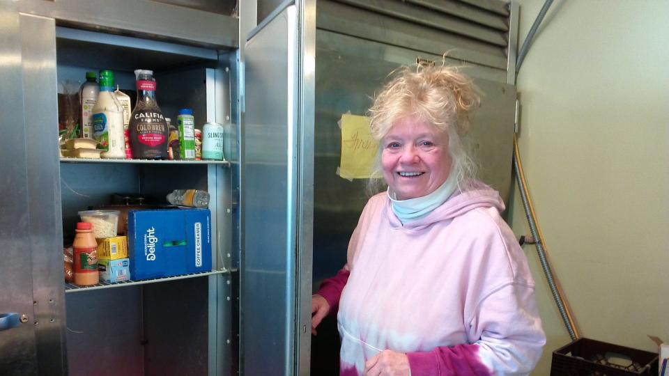 Barb Donnelly, director of outreach ministries for Showers of Hope, inside the walk-in freezer at the former St. Cyril’s convent in Binghamton, where food and clothing are handed out.