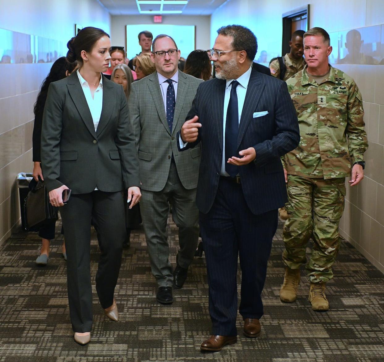 Harry Coker Jr., the White House National Cyber Director talks with Rhiannon Holley, a military spouse who is a Fayetteville Technical Community College graduate and the Department Chair, Systems Security and Analysis in FTCC’s Information Technology division. Coker visited the campus on Wednesday, March 20, 2024, to talk cybersecurity jobs.