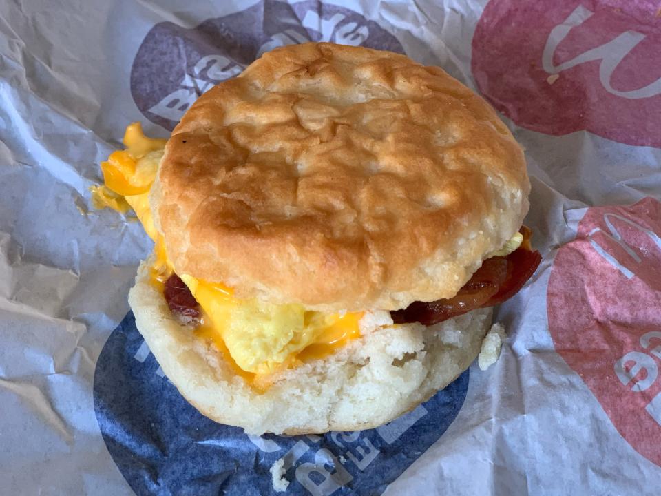 McDonald's bacon, egg, and cheese biscuit on white wrapper