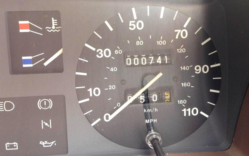 odometer, fuel gauge and warning lights of a 1980s Austin Metro