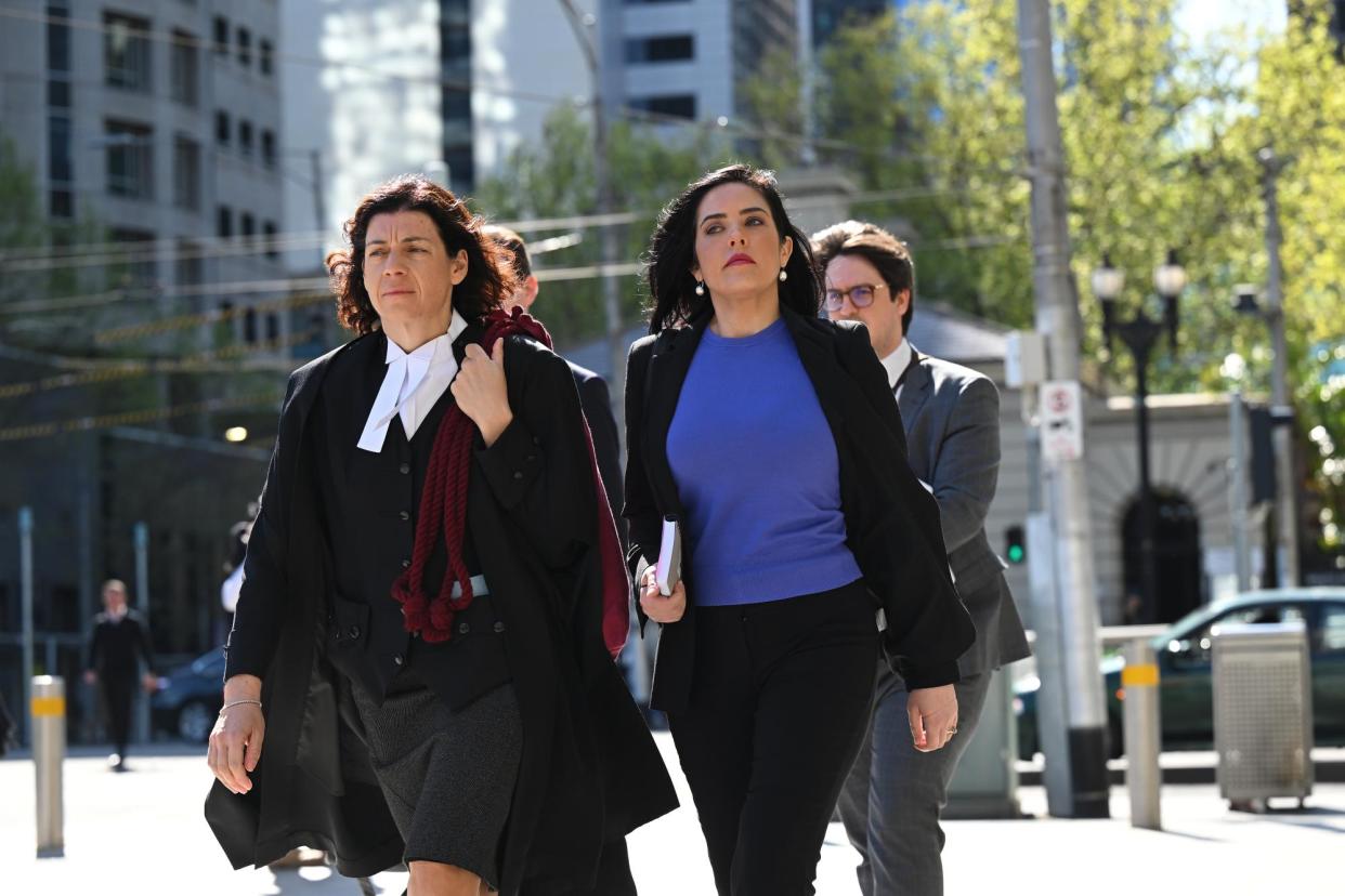 <span>Moira Deeming (right) and lawyer Sue Chrysanthou SC, arrive at the federal court of Australia in Melbourne on Wednesday. The Victorian MP is suing state opposition leader, John Pesutto, for allegedly falsely portraying her as a Nazi sympathiser.</span><span>Photograph: James Ross/AAP</span>