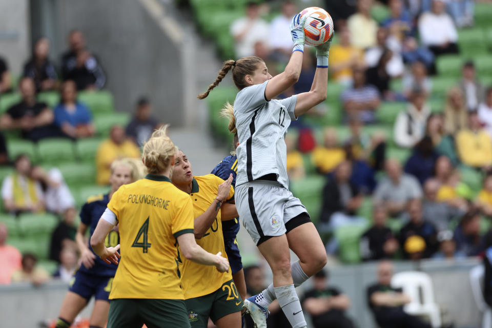 Australia's goalkeeper Teagan Micah, right, makes a save against Sweden during their women's friendly soccer match in Melbourne, Australia, Saturday, Nov. 12, 2022. (Asanka Brendon Ratnayake)