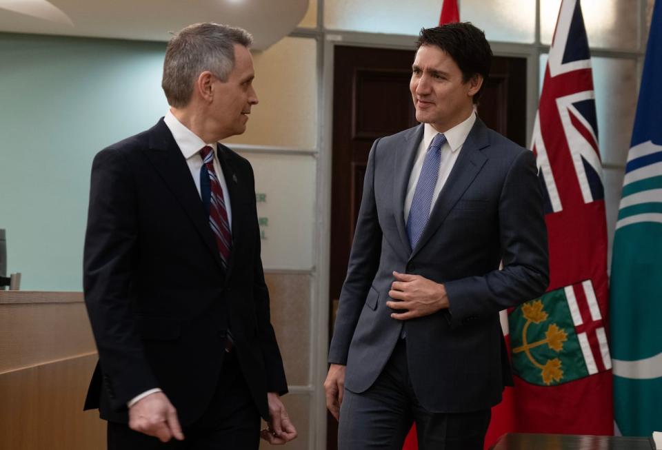 Prime Minister Justin Trudeau, right, speaks with Ottawa Mayor Mark Sutcliffe at city hall in Ottawa on April 18, 2024.
