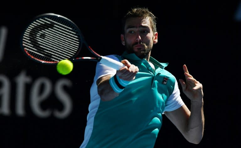 Croatia's sixth seed Marin Cilic advanced to the third round, easily beating Joao Sousa