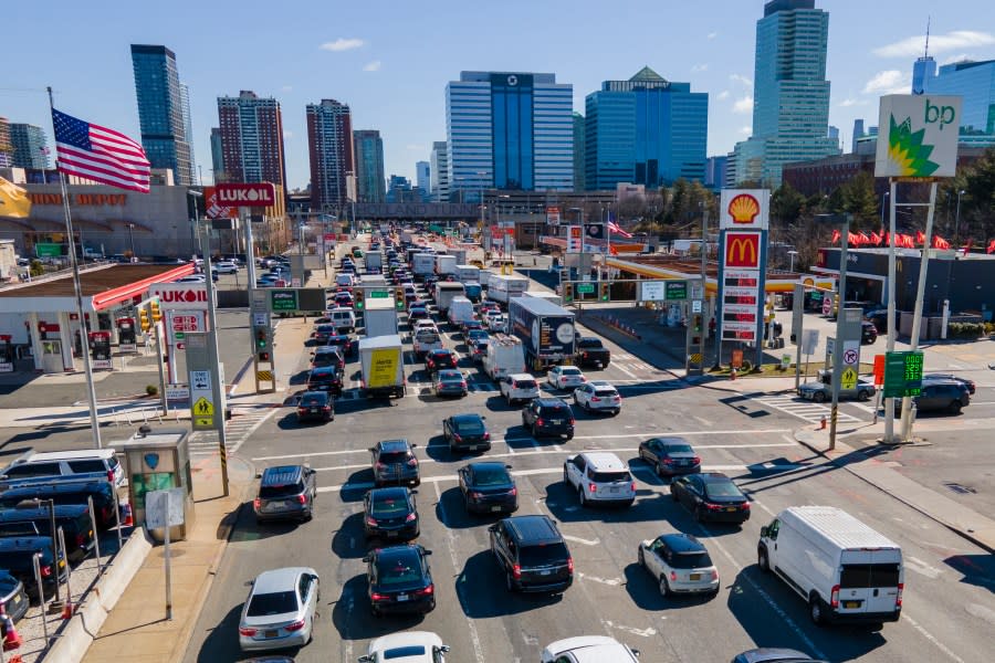 Commuters wait to drive through the Holland Tunnel into New York City during morning rush hour traffic in Jersey City, N.J.,, Wednesday, March 8, 2023. A study published Wednesday, May 22, 2024, says U.S. vehicles hit a record average age of 12.6 years in 2024 as people continue to hang on to their rides largely because new ones cost so much. (AP Photo/Ted Shaffrey, File)
