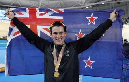 Track Cycling - Gold Coast 2018 Commonwealth Games - Men's Sprint Medal Ceremony - Anna Meares Velodrome - Gold Coast, Australia - April 7, 2018. Sam Webster of New Zealand celebrates winning a gold medal. REUTERS/Paul Childs