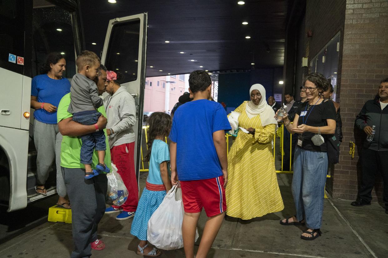 Migrants arrive on a bus at the Port Authority from Texas to Manhattan, New York on Thursday, Sept. 22, 2022.