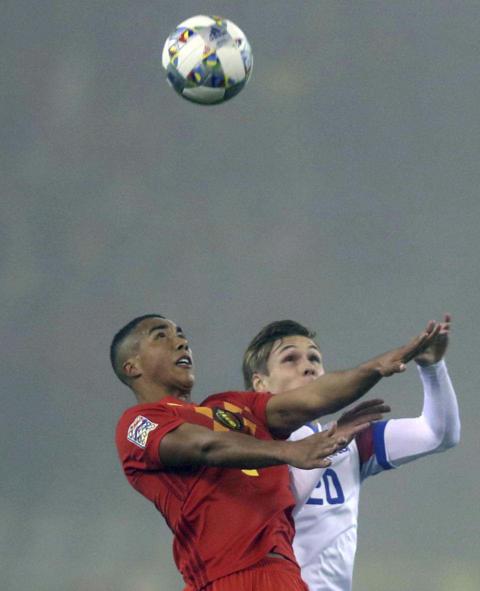 Belgium's Youri Tielemans, left, goes up agains Iceland's Arnor Sigurdsson during the UEFA Nations League soccer match between Belgium and Iceland at the King Baudouin stadium in Brussels, Thursday, Nov. 15, 2018. (AP Photo/Francisco Seco)