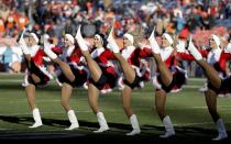 <p>Denver Broncos cheerleaders perform during the first half of an NFL football game against the New England Patriots Sunday, Dec. 18, 2016, in Denver. (AP Photo/Jack Dempsey) </p>